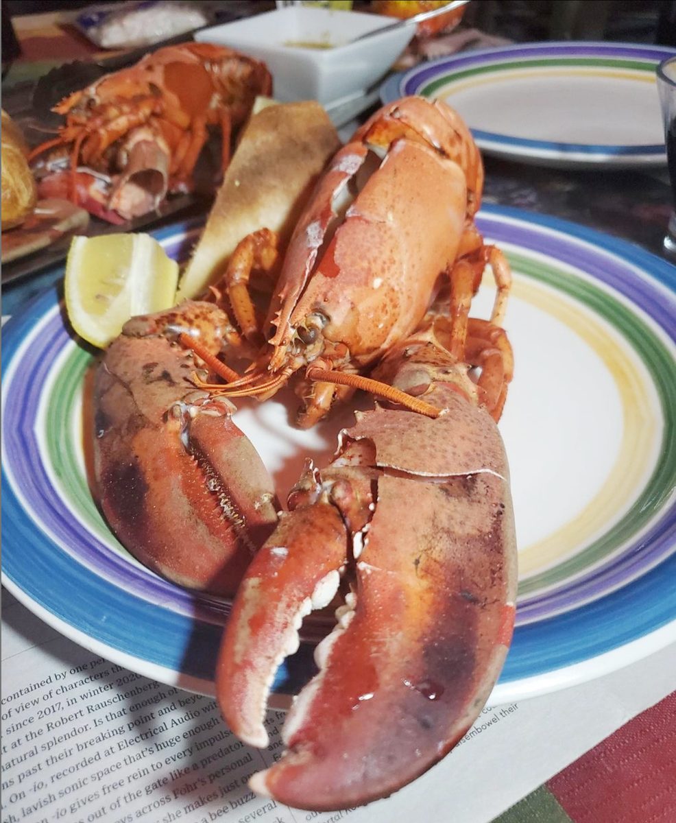 Whole lobster, split and served with lemon